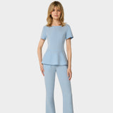 Bluza medyczna damska z baskinką KIM w kolorze Baby Blue - kobieca, taliowana - Vena Uniformy