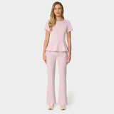 Spodnie medyczne damskie flare w kolorze Pastel Pink - dopasowane w biodrach, rozszerzane od kolana - Vena Uniformy