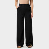 Damskie spodnie medyczne w kolorze czarnym z szerokimi nogawkami i wysoką talią.